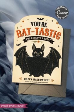 A card from the “7 Vintage Halloween Gift Card Holders” collection featuring a cartoon bat and the message, “You’re Bat-Tastic, You Deserve a Treat! Happy Halloween! Thanks for all you do from the Browns.” Perfect as one of your Halloween gift card holders, it’s pictured here atop an envelope with blue fabric nearby.