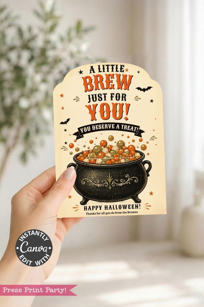 A hand holds a Halloween card featuring a cauldron, colorful bubbles, bats, and playful fonts that read: “A little brew just for you! You deserve a treat! Happy Halloween!”—a charming addition to the 7 Vintage Halloween Gift Card Holders, perfect for adding festive flair to your seasonal gifts.