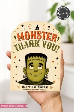 A hand holds one of the 7 Vintage Halloween Gift Card Holders, designed as a thank-you card featuring a cartoon Frankensteinβs monster with bolts in his neck and the greeting βA MONSTER THANK YOU!β above him. Surrounded by stars, lightning bolts, and festive colors, this playful holder is a perfect way to present any Halloween gift card.