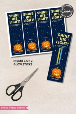 Printable bookmarks with “Shine His Light!” text, a pumpkin, stars, space for glow sticks, and “From Calvin.” Scissors placed nearby. Design is on a dark blue background.