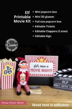 An elf doll wearing 3D glasses sits with an Elf Arrival Printable Bundle, Christmas Elf Kit, featuring a popcorn bucket, movie theater props, printable tickets, a clapperboard, and a mini popcorn box for an elf arrival.