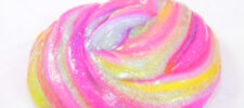 Foolproof slime recipe, striped slime with clear and glitter slime made with glue and contact solution.