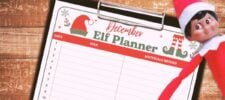 A December Elf Planner sheet on a clipboard is on a wooden surface. An Elf doll peeks in from the right side of the image, appearing festive and playful, making this scene perfect for showcasing an elf on the shelf printable.