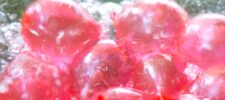 15 best competitive water balloon games for teens, kids, youth activities. Red water balloons in bowl. Press Print Party