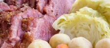 oven roasted corned beef and steamed cabbage on a plate with potatoes and carrots- baking oven cooked -. Press Print Party!