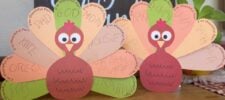 Free thankful turkey printable craft template for kids - 2 colorful printable turkeys on table - Press Print Party!